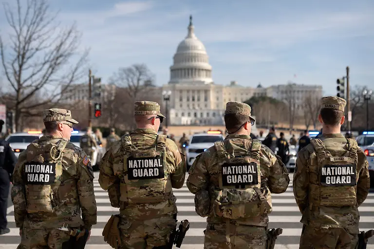 National-Guard-members-stand-before-the-body-of-Metropolitan-Police-Department-officer-Terry-Bennett-is-driven-past-the-Capitol-Thursday-Jan-8-2026-in-Washington