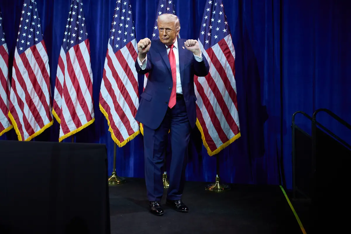 FILE-President-Donald-Trump-dances-as-he-walks-off-stage-after-speaking-to-House-Republican-lawmakers-during-their-annual-policy-retreat-Tuesday-Jan-6-2026-in-Washington