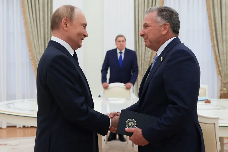 FILE-Russian-President-Vladimir-Putin-and-U-S-President-Donald-Trump-s-special-envoy-Steve-Witkoff-shake-hands-during-their-meeting-at-the-Kremlin-in-Moscow-on-Aug-6-2025