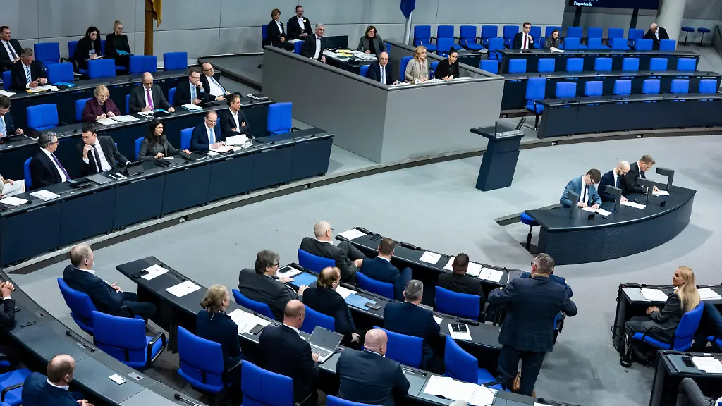 German-Interior-Minister-Alexander-Dobrindt-answers-a-question-from-a-Member-of-Parliament-of-the-right-wing-party-Alternative-for-Germany-AfD-during-a-question-time-in-the-Lower-House-of-Parliament-Bundestag-in-Berlin-Germany-on-January-14-2026