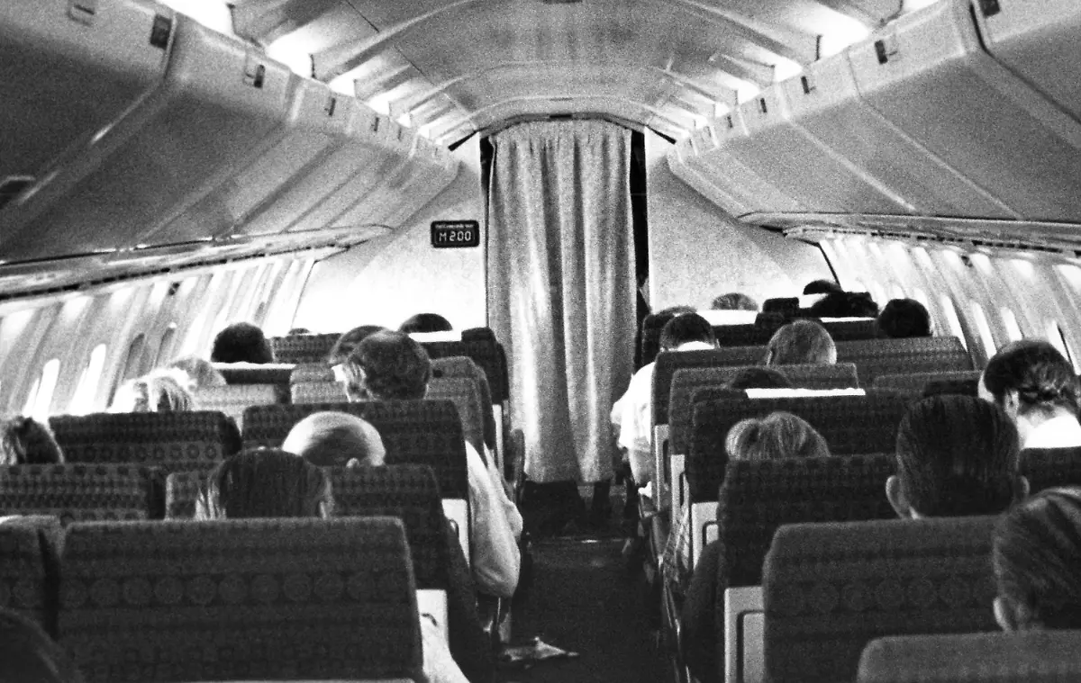 Passengers-aboard-a-Concorde-supersonic-jetliner-flight-await-lunch-as-the-delta-winged-aircraft-cruises-over-the-Atlantic-Ocean-at-twice-the-speed-of-sound-May-1978-The-digital-display-on-the-left-bulkhead-at-the-front-of-the-cabin-shows-that-the-plane-has-reached-Mach-2