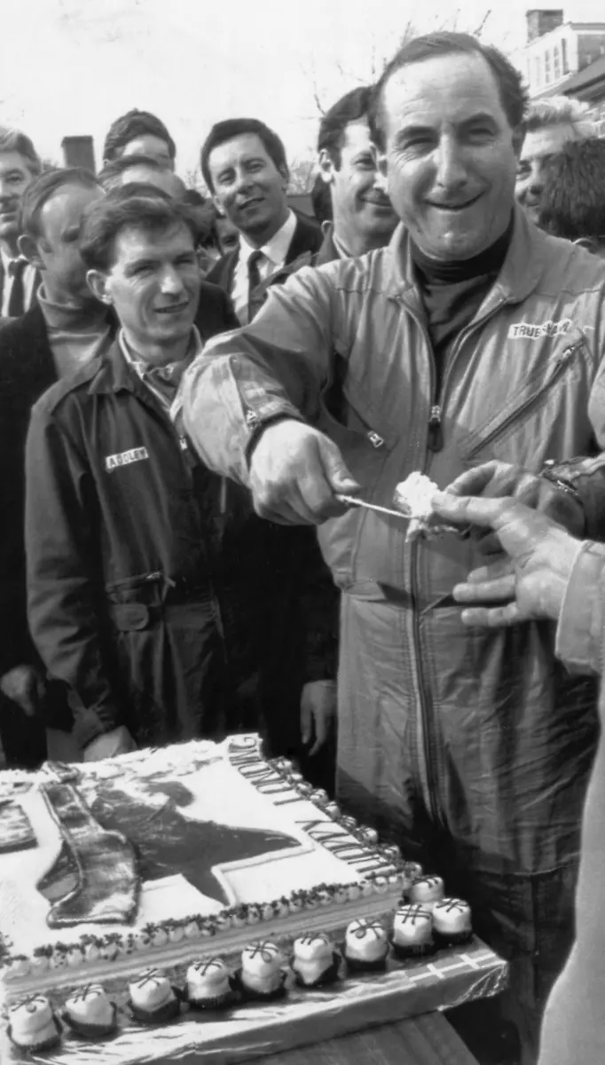 Concorde-002-test-pilot-Brian-Trubshaw-hands-out-pieces-of-celebration-cake-on-April-9-1969-in-Filton-after-he-and-his-crew-had-successfully-flown-the-Anglo-French-supersonic-aircraft-on-its-test-flight