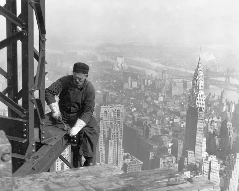Construction-worker-on-the-Empire-state-building-New-York-City-The-Chrysler-building-is-seen-to-the-right