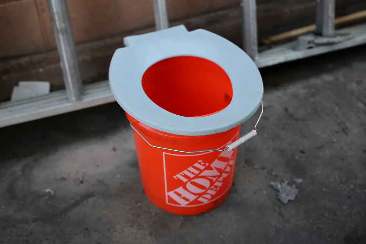 A-makeshift-toilet-is-seen-around-the-back-of-the-RV-where-Terry-Kilgore-70-now-lives-after-losing-his-home-to-the-Eaton-Fire-in-January-2025-at-his-property-in-Altadena-California-U-S-June-27-2025-Kilgore-who-once-played-with-former-Van-Halen-frontman-David-Lee-Roth-says-he-lost-some-of-his-best-guitars-in-the-fire-along-with-an-estimated-120-000-in-equipment-from-his-home-studio-Six-months-after-the-wildfires-that-devastated-the-eastern-and-western-flanks-of-Los-Angeles-Kilgore-s-RV-solution-is-one-way-victims-are-coping-as-the-arduous-rebuilding-effort-goes-on-You-would-never-know-it-but-it-was-pretty-here-It-s-never-going-to-be-pretty-like-it-was-he-said-The-place-I-grew-up-in-is-gone-forever-It-s-a-memory-REUTERS-Daniel-Cole-SEARCH-COLE-ALTADENA-WILDFIRES-FOR-THIS-STORY-SEARCH-WIDER-IMAGE-FOR-ALL-STORIES