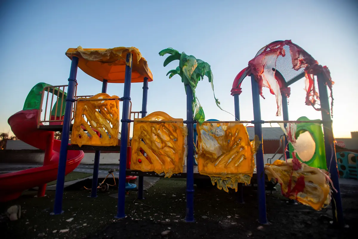 A-playground-melted-and-destroyed-by-fire-is-seen-in-a-burnt-area-as-the-Eaton-Fire-one-of-several-simultaneous-blazes-ripping-across-Los-Angeles-County-continues-in-Altadena-California-U-S-January-14-2025