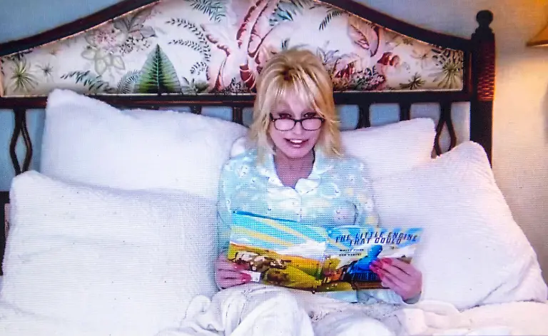 April-2-2020-DOLLY-PARTON-74-helps-get-your-kids-to-sleep-with-Goodnight-with-Dolly-tonite-reading-The-Little-Engine-That-Could-online-during-Coronavirus-COVID-19-outbreak-lockdown-Starting-tonight-and-every-Thursday-7-p-m-ET-Streaming-exclusively-on-Imagination-Library-Dolly-Parton-World-Choice-Investments-Dollywood-social-channels-and-YouTube-Dolly-will-read-a-new-classic-every-week