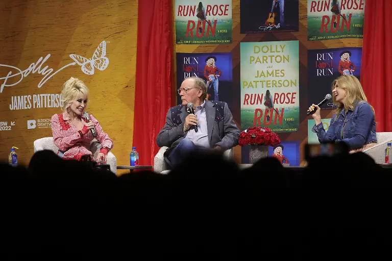 AUSTIN-TEXAS-MARCH-18-L-R-Dolly-Parton-James-Patterson-and-Connie-Britton-have-a-conversation-on-stage-to-discuss-Parton-s-and-Patterson-s-book-collaboration-Run-Rose-Run-at-ACL-Live-during-Blockchain-Creative-Labs-Dollyverse-event-at-SXSW-during-the-2022-SXSW-Conference-and-Festivals-on-March-18-2022-in-Austin-Texas