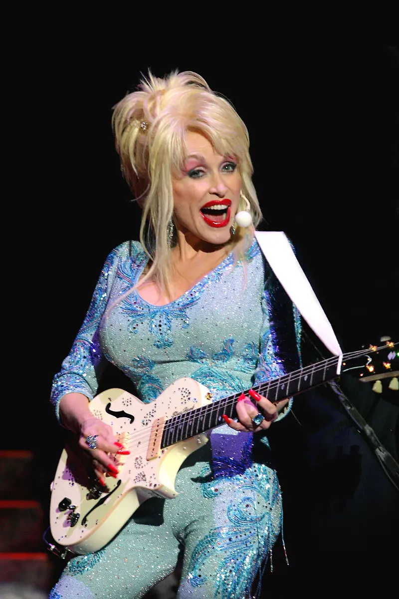 ATLANTIC-CITY-NJ-NOVEMBER-12-Dolly-Parton-performs-during-her-Hello-Dolly-tour-at-the-Circus-Maximus-showroom-in-Caesars-Atlantic-City-Casino-Hote-November-12-2004-in-Atlantic-City-New-Jersey-Photo-by-Donald-B
