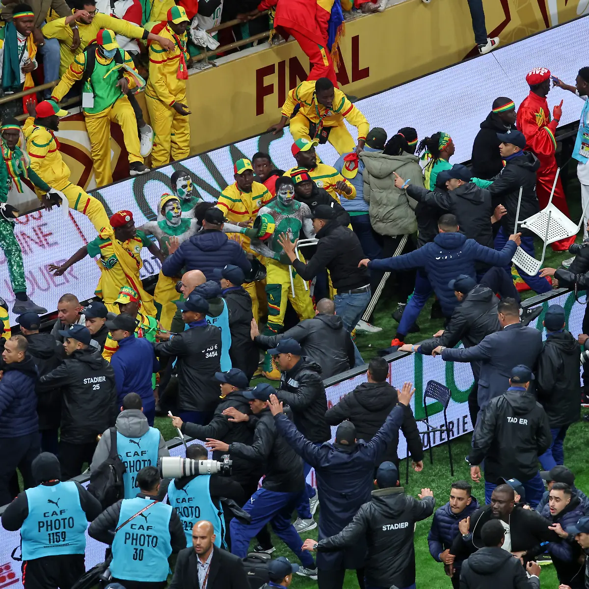 Senegal-supporters-clash-with-security-services-after-a-controversial-penalty-was-awarded-to-Morocco-late-on-during-the-Africa-Cup-of-Nations-final-soccer-match-between-Senegal-and-Morocco-in-Rabat-Morocco-Sunday-Jan-18-2026