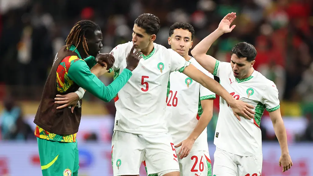 Soccer-Football-CAF-Africa-Cup-of-Nations-Morocco-2025-Final-Senegal-v-Morocco-Prince-Moulay-Abdellah-Stadium-Rabat-Morocco-January-18-2026-Senegal-s-Pathe-Cis-clashes-with-Morocco-s-Nayef-Aguerd-and-Brahim-Diaz-after-a-penalty-was-awarded-to-Morocco-following-a-VAR-review-REUTERS-Amr-Abdallah-Dalsh