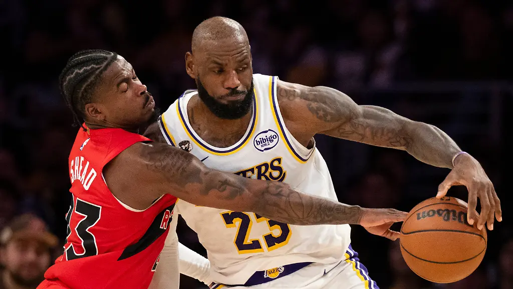Toronto-Raptors-guard-Jamal-Shead-23-defends-Los-Angeles-Lakers-forward-LeBron-James-23-during-the-second-half-of-an-NBA-basketball-game-in-Los-Angeles-Sunday-Jan-18-2026