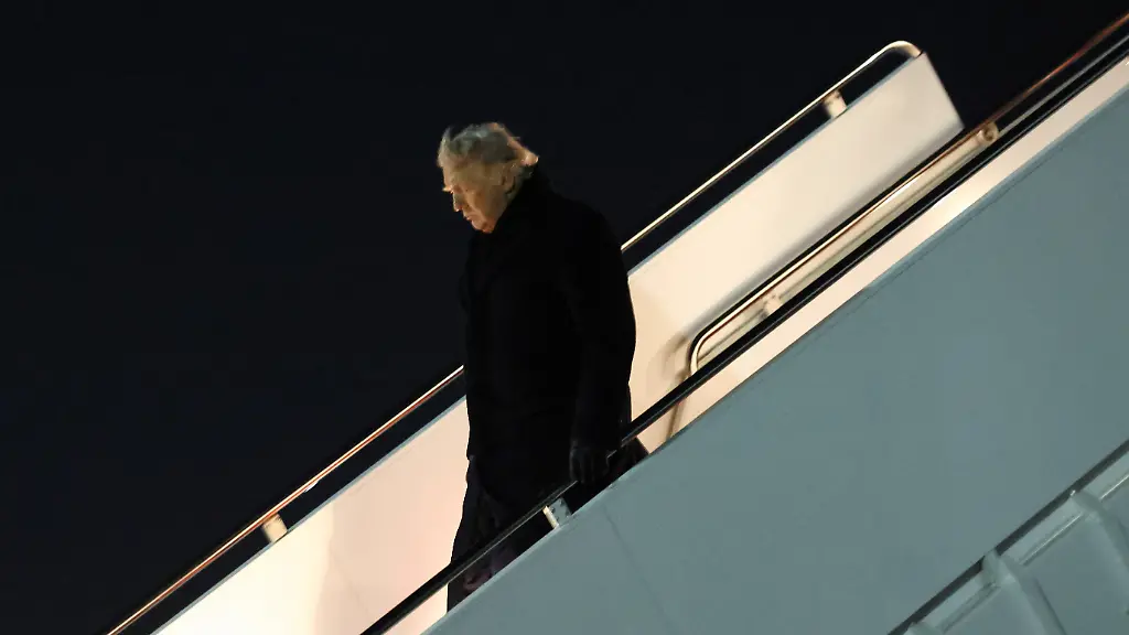 U-S-President-Donald-Trump-deboards-Air-Force-One-upon-his-return-from-Florida-at-Joint-Base-Andrews-Maryland-U-S-January-20-2026