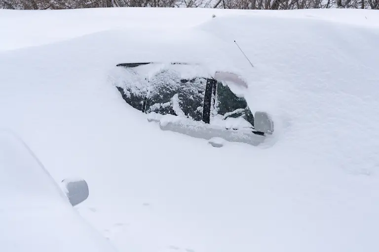 Russia-Weather-9086843-15-01-2026-A-view-shows-a-snow-covered-car-after-a-heavy-snowfall-in-Petropavlovsk-Kamchatsky-Kamchatka-Territory-Russia