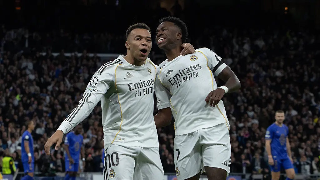 January-20-2026-Madrid-Spain-Vinicius-Jr-r-and-Kylian-MbappA-L-of-Real-Madrid-celebrate-a-goal-during-the-UEFA-Champions-League-match-between-Real-Madrid-and-AS-Monaco-played-at-the-Santiago-BernabA-u-Stadium-Final-score-Real-Madrid-6-1-AS-Monaco