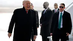 ZURICH-SWITZERLAND-JANUARY-21-U-S-President-Donald-Trump-disembarks-Air-Force-One-as-he-arrives-at-Zurich-Airport-before-attending-the-World-Economic-Forum-WEF-in-Davos-on-January-21-2026-in-Zurich-Switzerland-The-annual-meeting-of-political-and-business-leaders-comes-amid-rising-tensions-between-the-United-States-and-Europe-over-a-range-of-issues-including-Trump-s-vow-to-acquire-Greenland-a-semi-autonomous-Danish-territory