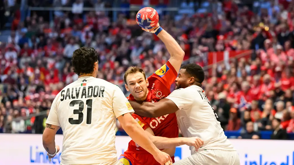 Oslo-Norway-31st-January-2025-Mathias-Gidsel-19-of-Denmark-and-Victor-Iturriza-8-of-Portugal-seen-during-the-2025-IHF-Mens-Handball-World-Cup-semi-final-between-Denmark-and-Portugal-at-Unity-Arena-in-Oslo