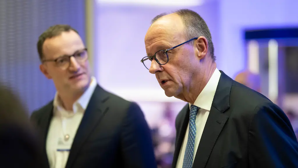 German-Federal-Chancellor-Friedrich-Merz-arrives-for-the-56th-annual-meeting-of-the-World-Economic-Forum-WEF-in-Davos-Switzerland-Wednesday-January-21-2026-The-meeting-under-the-topic-A-Spirit-of-Dialogue-brings-together-entrepreneurs-scientists-corporate-and-political-leaders-in-Davos-and-takes-place-from-January-19-to-23-in-Davos