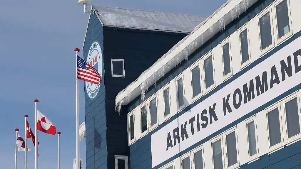 Danish-Greenlandic-and-U-S-flags-fly-at-the-Danish-armed-forces-Arctic-Command-in-Nuuk-Greenland-March-27-2025