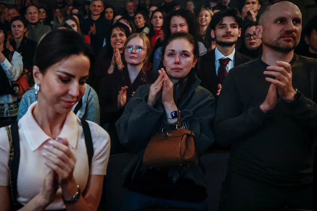 The-audience-reacts-after-the-premiere-of-an-18th-century-Ukrainian-parody-of-Virgil-s-Aeneid-performed-by-the-Veterans-Theatre-group-amid-Russia-s-attack-on-Ukraine-in-Kyiv-Ukraine-December-4-2025-Member-of-the-theater-group-and-veterans-psychologist-Yehor-Babenko-27-said-the-transformative-trauma-of-serious-injury-often-compels-people-to-seek-meaning-in-something-new-He-said-it-was-critical-for-his-fellow-comrades-to-understand-that-life-does-not-simply-end-after-a-serious-injury-Sometimes-you-understand-it-s-the-opposite-that-it-just-starts-getting-going-REUTERS-Alina-Smutko-SEARCH-UKRAINE-SMUTKO-THEATRE-FOR-THIS-STORY-SEARCH-WIDER-IMAGE-FOR-ALL-STORIES