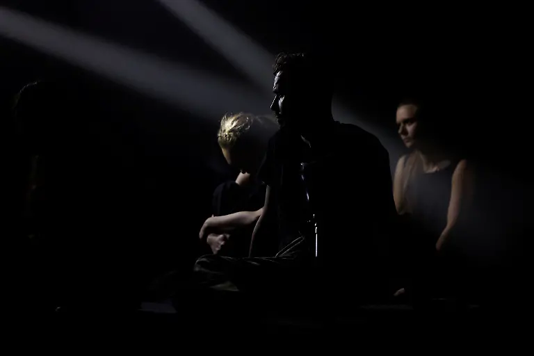 Ivan-Voinov-front-33-and-fellow-members-of-the-Veterans-Theatre-group-perform-during-the-premiere-of-an-18th-century-Ukrainian-parody-of-Virgil-s-Aeneid-amid-Russia-s-attack-on-Ukraine-in-Kyiv-Ukraine-December-4-2025-Fellow-member-and-veterans-psychologist-Yehor-Babenko-27-said-the-transformative-trauma-of-serious-injury-often-compels-people-to-seek-meaning-in-something-new-He-said-it-was-critical-for-his-fellow-comrades-to-understand-that-life-does-not-simply-end-after-a-serious-injury-Sometimes-you-understand-it-s-the-opposite-that-it-just-starts-getting-going-REUTERS-Alina-Smutko-SEARCH-UKRAINE-SMUTKO-THEATRE-FOR-THIS-STORY-SEARCH-WIDER-IMAGE-FOR-ALL-STORIES