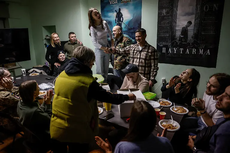 Members-of-the-Veterans-Theatre-group-celebrate-the-birthday-of-founder-Akhtem-Seitablaiev-at-their-rehearsal-place-in-Crimean-House-amid-Russia-s-attack-on-Ukraine-in-Kyiv-Ukraine-December-13-2025-Fellow-member-and-veterans-psychologist-Yehor-Babenko-27-said-the-transformative-trauma-of-serious-injury-often-compels-people-to-seek-meaning-in-something-new-He-said-it-was-critical-for-his-fellow-comrades-to-understand-that-life-does-not-simply-end-after-a-serious-injury-Sometimes-you-understand-it-s-the-opposite-that-it-just-starts-getting-going-REUTERS-Alina-Smutko-SEARCH-UKRAINE-SMUTKO-THEATRE-FOR-THIS-STORY-SEARCH-WIDER-IMAGE-FOR-ALL-STORIES
