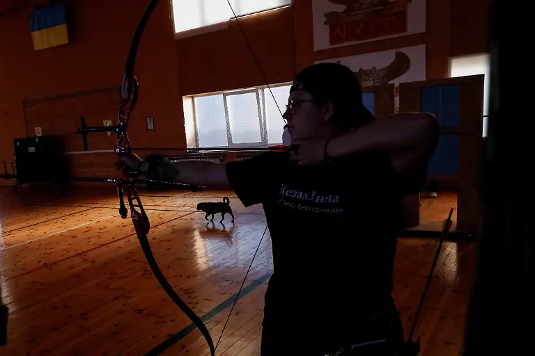 Inna-Korolenko-26-a-veteran-combat-medic-practices-ahead-of-a-national-archery-competition-amid-Russia-s-attack-on-Ukraine-in-Kyiv-Ukraine-September-11-2025-Fellow-member-and-veterans-psychologist-Yehor-Babenko-27-said-the-transformative-trauma-of-serious-injury-often-compels-people-to-seek-meaning-in-something-new-He-said-it-was-critical-for-his-fellow-comrades-to-understand-that-life-does-not-simply-end-after-a-serious-injury-Sometimes-you-understand-it-s-the-opposite-that-it-just-starts-getting-going-REUTERS-Alina-Smutko-SEARCH-UKRAINE-SMUTKO-THEATRE-FOR-THIS-STORY-SEARCH-WIDER-IMAGE-FOR-ALL-STORIES