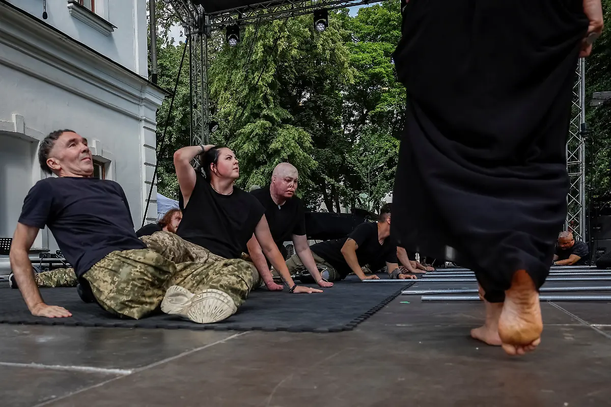Members-of-the-Veterans-Theatre-group-during-a-summer-performance-at-a-documentary-movies-festival-amid-Russia-s-attack-on-Ukraine-in-Kyiv-Ukraine-August-17-2025-Fellow-member-and-veterans-psychologist-Yehor-Babenko-27-said-the-transformative-trauma-of-serious-injury-often-compels-people-to-seek-meaning-in-something-new-He-said-it-was-critical-for-his-fellow-comrades-to-understand-that-life-does-not-simply-end-after-a-serious-injury-Sometimes-you-understand-it-s-the-opposite-that-it-just-starts-getting-going-REUTERS-Alina-Smutko-SEARCH-UKRAINE-SMUTKO-THEATRE-FOR-THIS-STORY-SEARCH-WIDER-IMAGE-FOR-ALL-STORIES