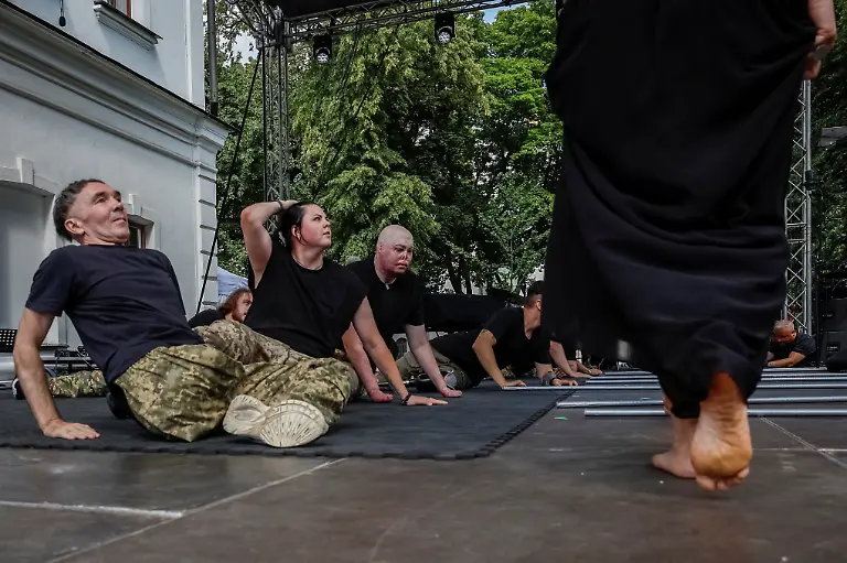 Members-of-the-Veterans-Theatre-group-during-a-summer-performance-at-a-documentary-movies-festival-amid-Russia-s-attack-on-Ukraine-in-Kyiv-Ukraine-August-17-2025-Fellow-member-and-veterans-psychologist-Yehor-Babenko-27-said-the-transformative-trauma-of-serious-injury-often-compels-people-to-seek-meaning-in-something-new-He-said-it-was-critical-for-his-fellow-comrades-to-understand-that-life-does-not-simply-end-after-a-serious-injury-Sometimes-you-understand-it-s-the-opposite-that-it-just-starts-getting-going-REUTERS-Alina-Smutko-SEARCH-UKRAINE-SMUTKO-THEATRE-FOR-THIS-STORY-SEARCH-WIDER-IMAGE-FOR-ALL-STORIES