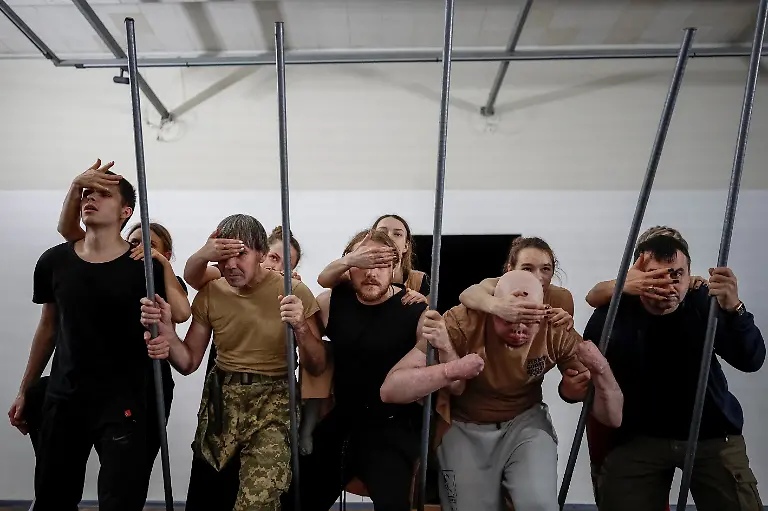 Members-of-the-Veterans-Theatre-group-rehearse-for-an-18th-century-Ukrainian-parody-of-Virgil-s-Aeneid-amid-Russia-s-attack-on-Ukraine-in-Kyiv-Ukraine-November-12-2025-Fellow-member-and-veterans-psychologist-Yehor-Babenko-27-said-the-transformative-trauma-of-serious-injury-often-compels-people-to-seek-meaning-in-something-new-He-said-it-was-critical-for-his-fellow-comrades-to-understand-that-life-does-not-simply-end-after-a-serious-injury-Sometimes-you-understand-it-s-the-opposite-that-it-just-starts-getting-going-REUTERS-Alina-Smutko-SEARCH-UKRAINE-SMUTKO-THEATRE-FOR-THIS-STORY-SEARCH-WIDER-IMAGE-FOR-ALL-STORIES