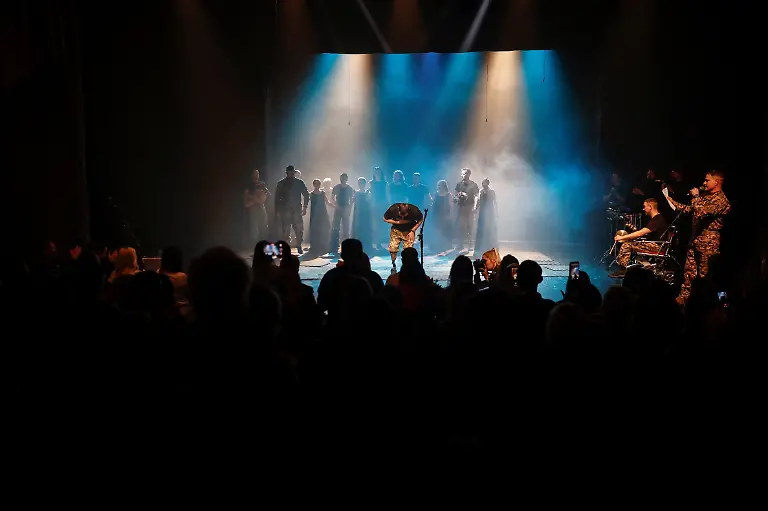 Ukrainian-soldier-Artem-Moroz-46-bows-to-the-audience-after-the-premiere-of-an-18th-century-Ukrainian-parody-of-Virgil-s-Aeneid-performed-by-the-Veterans-Theatre-group-amid-Russia-s-attack-on-Ukraine-in-Kyiv-Ukraine-December-4-2025-Fellow-member-and-veterans-psychologist-Yehor-Babenko-27-said-the-transformative-trauma-of-serious-injury-often-compels-people-to-seek-meaning-in-something-new-He-said-it-was-critical-for-his-fellow-comrades-to-understand-that-life-does-not-simply-end-after-a-serious-injury-Sometimes-you-understand-it-s-the-opposite-that-it-just-starts-getting-going-REUTERS-Alina-Smutko-SEARCH-UKRAINE-SMUTKO-THEATRE-FOR-THIS-STORY-SEARCH-WIDER-IMAGE-FOR-ALL-STORIES