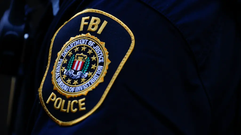 The-seal-and-motto-of-the-Federal-Bureau-of-Investigation-on-a-patch-worn-by-an-uniform-officer-Friday-Sept-22-2023-in-Washington-Aaron-M