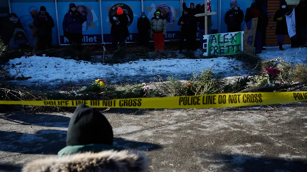 A-memorial-is-built-as-demonstrators-gather-in-south-Minneapolis-Minnesota-on-January-24-2026-after-a-man-is-shot-and-killed-by-U-S-Immigration-and-Customs-Enforcement-agents-earlier-that-morning-according-to-officials