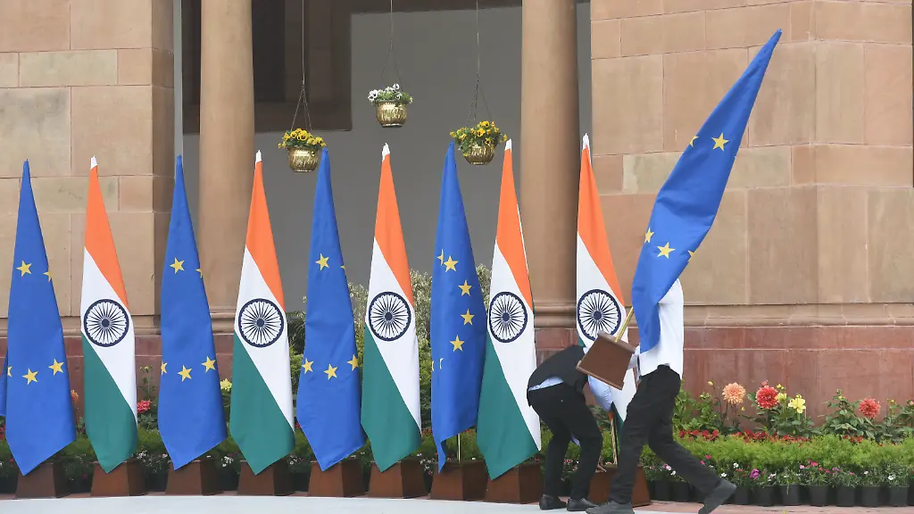 The-staff-of-Hyderabad-House-arranges-flags-of-EU-and-India-in-preparation-for-a-meeting-between-Prime-Minister-Narendra-Modi-and-European-Commission-President-Ursula-von-der-Leyen