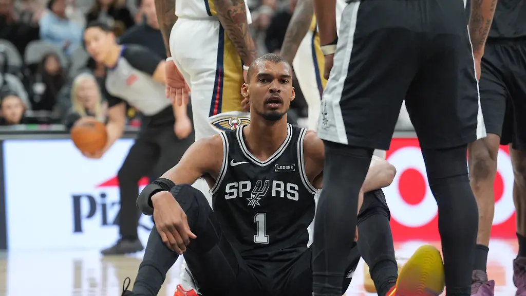 Jan-25-2026-San-Antonio-Texas-USA-San-Antonio-Spurs-forward-Victor-Wembanyama-1-sits-after-getting-fouled-in-the-first-half-against-the-New-Orleans-Pelicans-at-Frost-Bank-Center