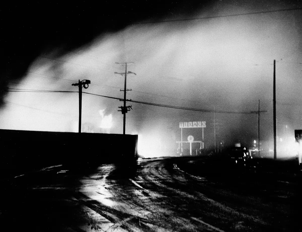 FILE-Gasoline-storage-tanks-are-shown-burning-in-the-early-morning-hours-of-March-28-1964-on-the-outskirts-of-Crescent-City-Calif-after-being-ignited-by-power-lines-broken-by-the-tidal-wave-caused-by-an-earthquake-in-Alaska