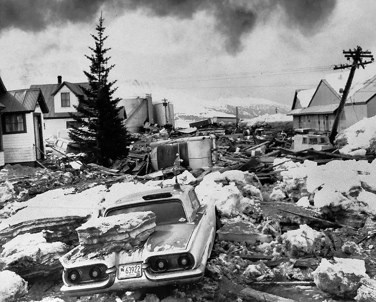 FILE-Where-cars-weren-t-buried-they-were-toss-and-damaged-by-huge-slabs-of-ice-pushed-ashore-by-the-tsunami-following-the-major-earthquake-at-Valdez-Alaska-which-struck-with-deadly-force-March-29-1964