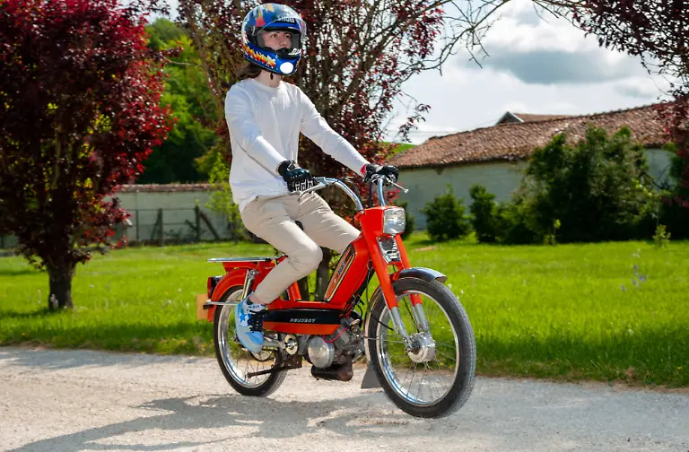 Gathering-of-Old-Mopeds-Piney-Peugeot-103-Gathering-of-vintage-mopeds-in-Piney-Chateau-de-Brantigny-department-of-Aube-France-June-11-2023-Photo-by-Helder-Januario-ABACAPRESS