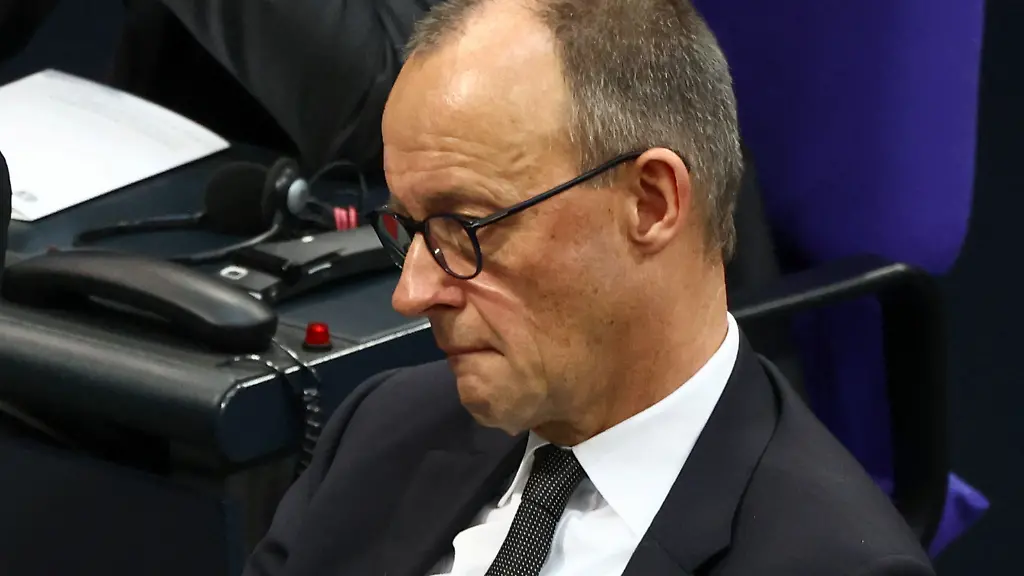 German-Chancellor-Friedrich-Merz-looks-on-as-Holocaust-survivor-Tova-Friedman-makes-a-speech-during-a-commemoration-for-the-victims-of-the-Holocaust-at-the-lower-house-of-parliament-the-Bundestag-in-Berlin-Germany-January-28-2026