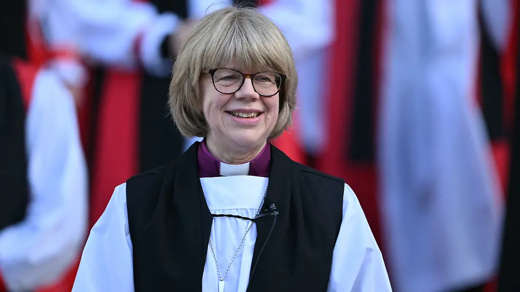 The-new-Archbishop-of-Canterbury-Sarah-Mullally-smiles-on-the-steps-of-St-Pauls-Cathedral-after-taking-part-in-a-Confirmation-of-Election-ceremony-in-London-on-January-28-2026-Sarah-Mullally-a-former-nurse-was-named-as-the-first-female-Archbishop-of-Canterbury-last-October-pledging-to-improve-safety-at-the-Church-of-England-following-an-abuse-scandal-that-ousted-her-predecessor