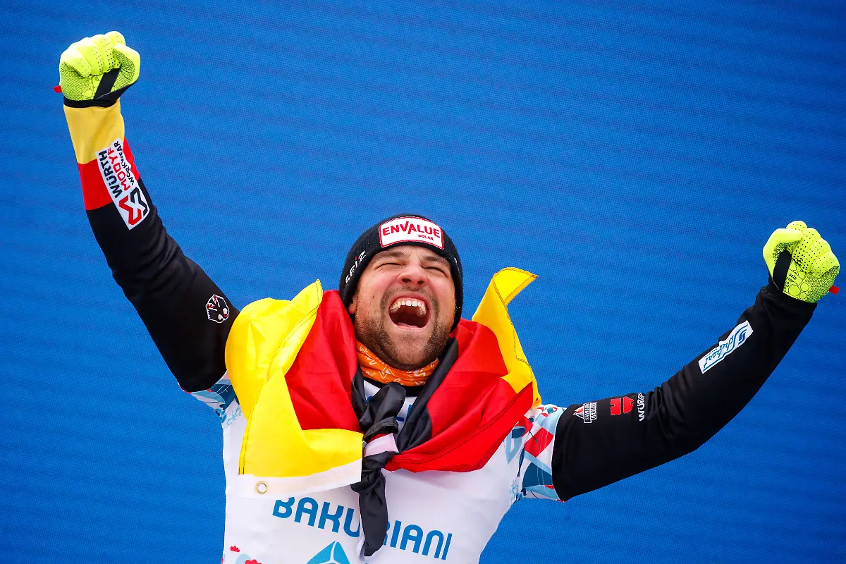 SNOWBOARD-FIS-SX-and-SB-World-Championships-Bakuriani-2023-BAKURIANI-GEORGIA-01-MAR-23-SNOWBOARD-FIS-Freestyle-Ski-and-Snowboard-World-Championships-SBX-Snowboard-Cross-ladies-men-award-ceremony-Image-shows-the-rejoicing-of-Martin-Noerl-GER