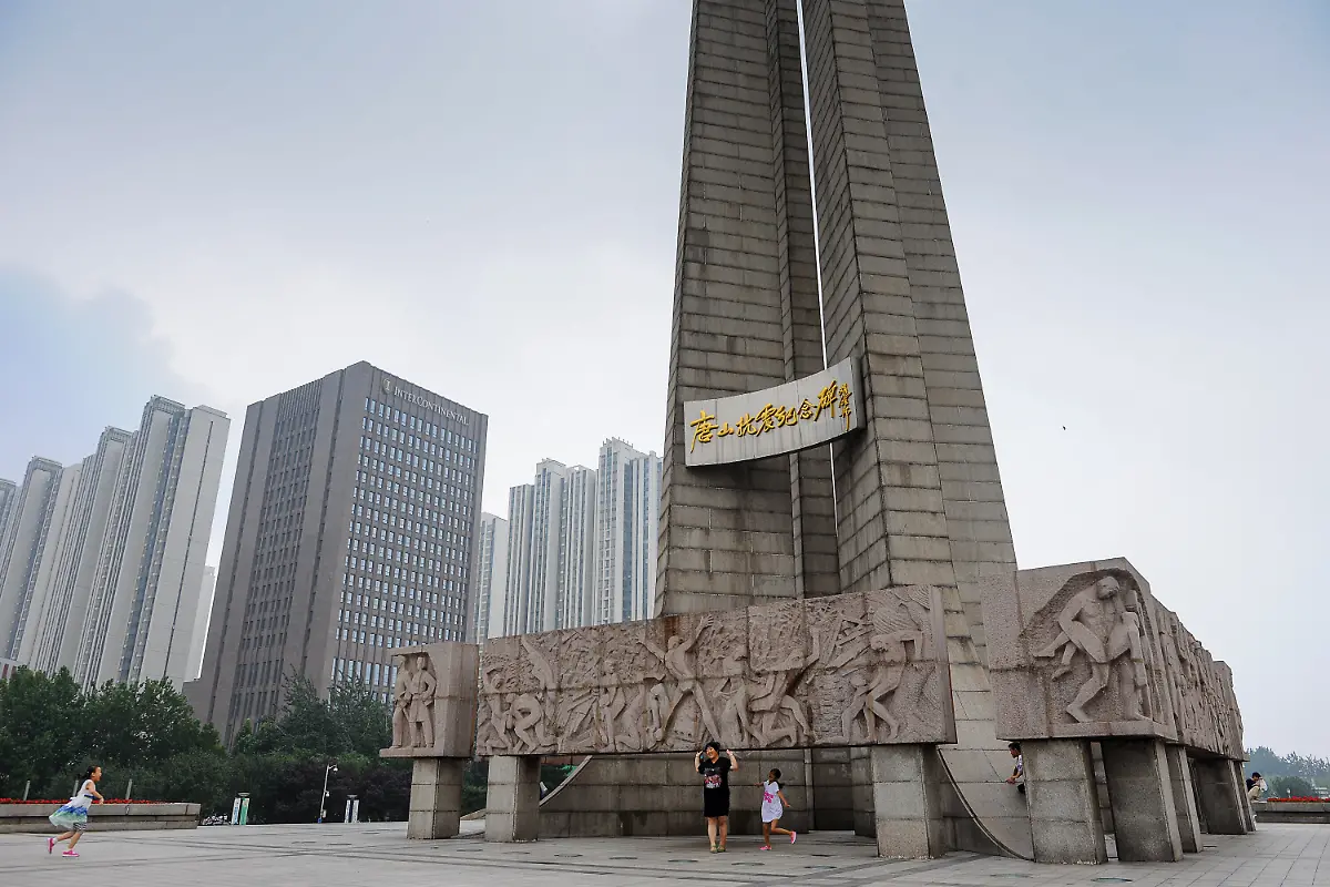 View-of-the-Anti-Seismic-Monument-or-Tangshan-Earthquake-Monument-in-Tangshan-city-north-China-s-Hebei-province-21-July-2016-The-city-of-Tangshan-in-north-China-s-Hebei-province-has-redeveloped-after-the-great-earthquake-40-years-ago-Tangshan-earthquake-of-1976-also-called-Great-Tangshan-Earthquake-took-place-on-July-28-1976-with-a-magnitude-of-7-5-which-nearly-razed-the-Chinese-coal-mining-and-industrial-city-of-Tangshan-located-about-68-miles-110-km-east-of-Beijing-The-death-toll-thought-to-be-one-of-the-largest-in-recorded-history-was-officially-reported-as-242-000-persons-but-it-may-have-been-as-high-as-655-000-At-least-700-000-more-people-were-injured-and-property-damage-was-extensive-reaching-even-to-Beijing-The-1976-Tangshan-earthquake-caused-liquefaction-and-bending-of-the-rails-on-the-Beijing-Shanhaiguan-railway-that-passes-through-Tangshan