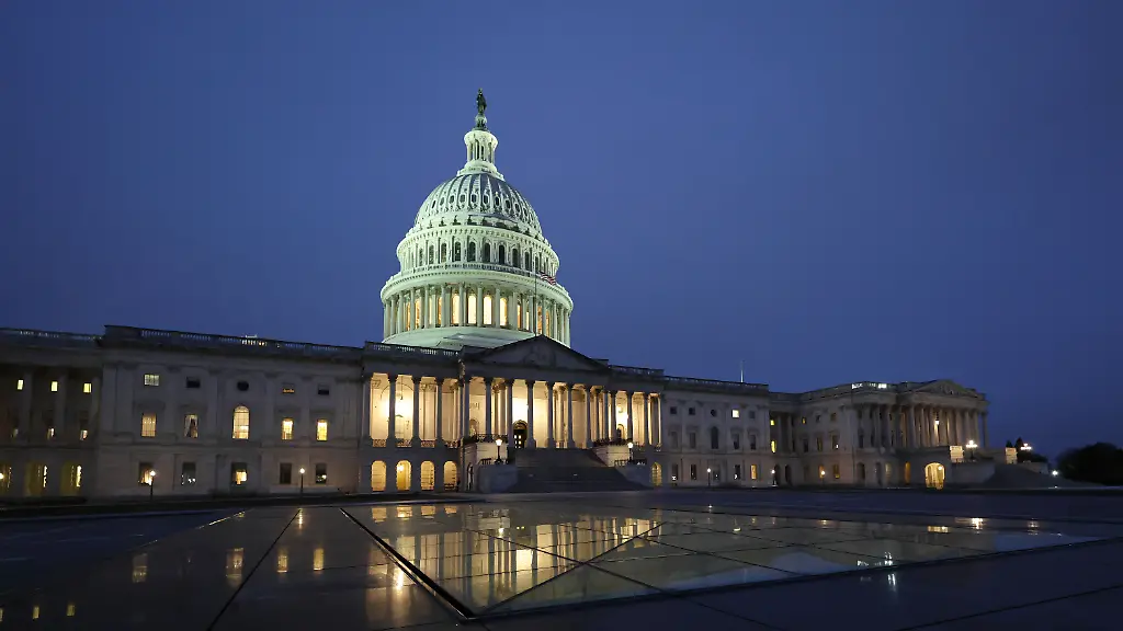 A-general-view-of-the-U-S-Capitol-building-with-a-reflection-Sunday-Nov-30-2025-in-Washington-Aaron-M