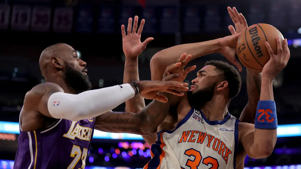 Feb-1-2026-New-York-New-York-USA-New-York-Knicks-center-Karl-Anthony-Towns-32-looks-to-pass-the-ball-against-Los-Angeles-Lakers-forward-LeBron-James-23-and-guard-Marcus-Smart-36-during-the-second-quarter-at-Madison-Square-Garden