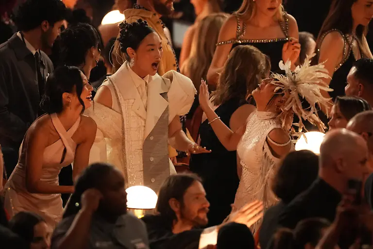 Audrey-Nuna-center-and-Rei-Ami-right-speak-in-the-audience-during-the-68th-annual-Grammy-Awards-on-Sunday-Feb-1-2026-in-Los-Angeles