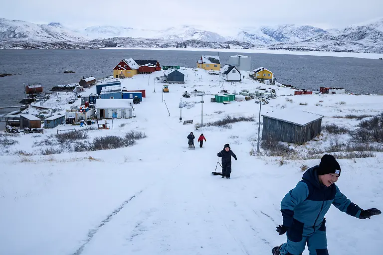 William-right-8-Malerak-centre-7-and-Viola-7-go-sledding-during-recess-outside-their-school-in-Kapisillit-Greenland-January-20-2026-The-concept-that-ownership-is-shared-collectively-is-central-to-the-Inuit-identity-It-has-survived-300-years-of-colonisation-and-is-written-into-law-People-can-own-houses-but-not-the-land-beneath-them-We-can-t-even-buy-our-own-land-ourselves-but-Trump-wants-to-buy-it-that-s-so-strange-to-us-said-village-catechist-Kaaleeraq-Ringsted-74-REUTERS-Marko-Djurica-SEARCH-DJURICA-GREENLAND-INUIT-FOR-THIS-STORY-SEARCH-WIDER-IMAGE-FOR-ALL-STORIES