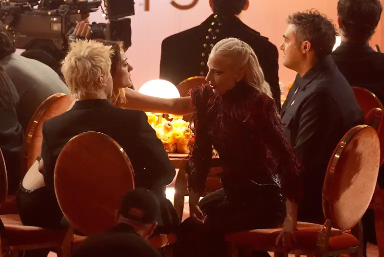 Charlotte-Lawrence-from-left-Andrew-Watt-and-Lady-Gaga-speak-in-the-audience-during-the-68th-annual-Grammy-Awards-on-Sunday-Feb-1-2026-in-Los-Angeles
