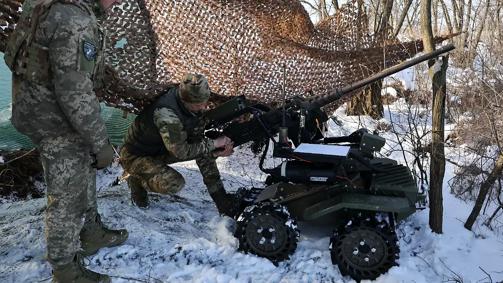 In-this-photo-provided-by-Ukraine-s-65th-Mechanized-Brigade-press-service-soldiers-test-land-drones-in-Zaporizhzhia-region-Ukraine-Monday-Jan-26-2026