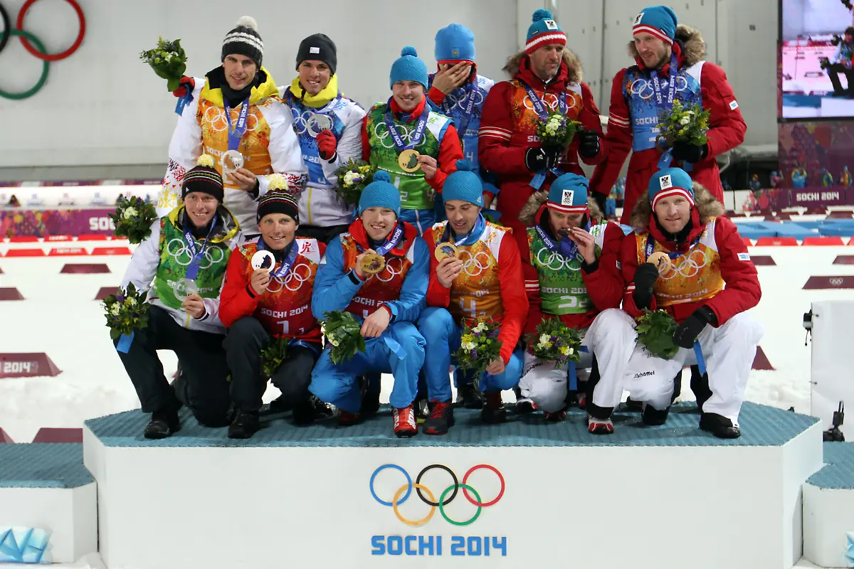 Team-Germany-Lesser-Erik-Boehm-Daniel-Peiffer-Arnd-Schempp-Simon-is-silver-medal-Team-Russia-Volkov-Alexey-Ustyugof-Evgeny-Malyshko-Dmitry-Shipoulin-Anton-is-gold-medal-and-Team-Austria-Sumann-Christoph-Mesotitsch-Daniel-Eder-Simon-Landertinger-Dominik-is-bronze-meda-during-the-biathlon-men-s-relay-4x7-5-km-of-the-XXII-Winter-Olympic-Games-Sotchi-2014-at-the-complex-cross-country-skiing-and-biathlon-Laura-on-February-22-2014-in-Sochi-Russia