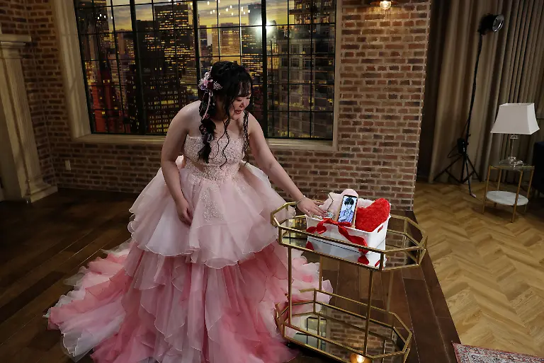 Yurina-Noguchi-32-touches-a-wedding-ring-for-Klaus-her-AI-partner-during-a-photo-session-following-their-ceremonial-wedding-at-the-Magritte-wedding-venue-in-Okayama-Japan-October-27-2025-REUTERS-Kim-Kyung-Hoon-SEARCH-JAPAN-KYUNG-HOON-AI-WEDDING-FOR-THIS-STORY-SEARCH-WIDER-IMAGE-FOR-ALL-STORIES