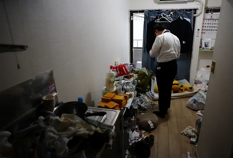 A-41-year-old-Japanese-man-who-held-a-ceremonial-wedding-with-the-two-dimensional-character-Kimera-Toyooka-in-2021-loosens-his-necktie-at-his-home-in-Tokyo-Japan-June-23-2025-REUTERS-Kim-Kyung-Hoon-SEARCH-JAPAN-KYUNG-HOON-AI-WEDDING-FOR-THIS-STORY-SEARCH-WIDER-IMAGE-FOR-ALL-STORIES